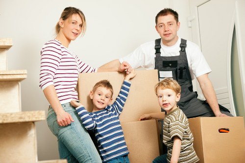 Furniture and IT equipment being handled during an office move