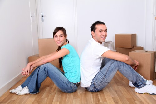 Flat removal team loading furniture and boxes