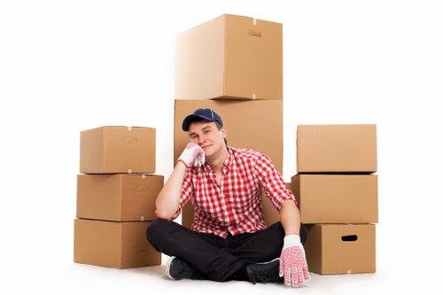 Boxes and furniture prepared for a student move in central London